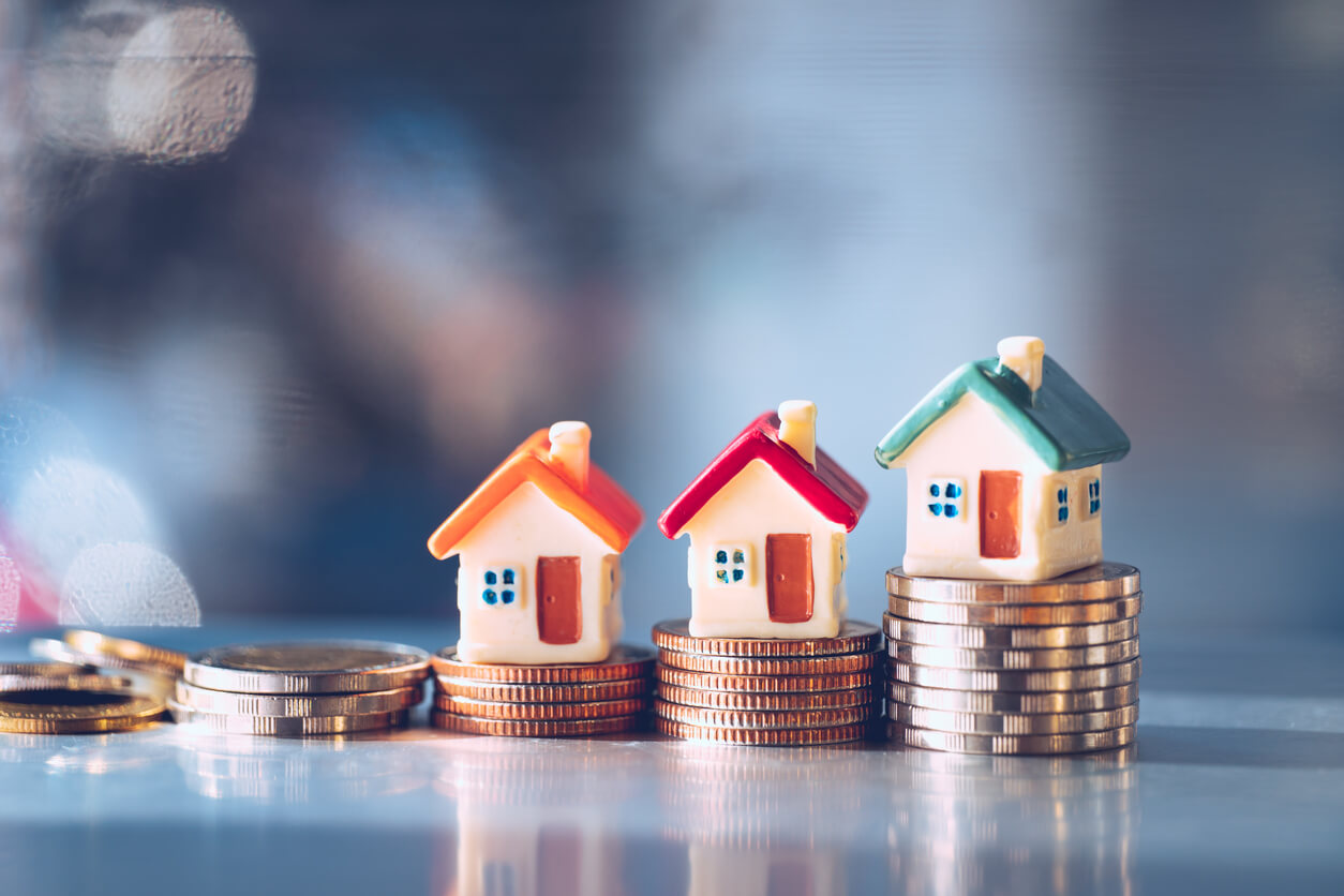 houses on top of coins