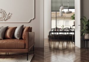a fully furnished living room with cream walls and hardwood floors